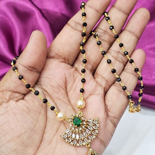 Black diamonds with green locket just 700