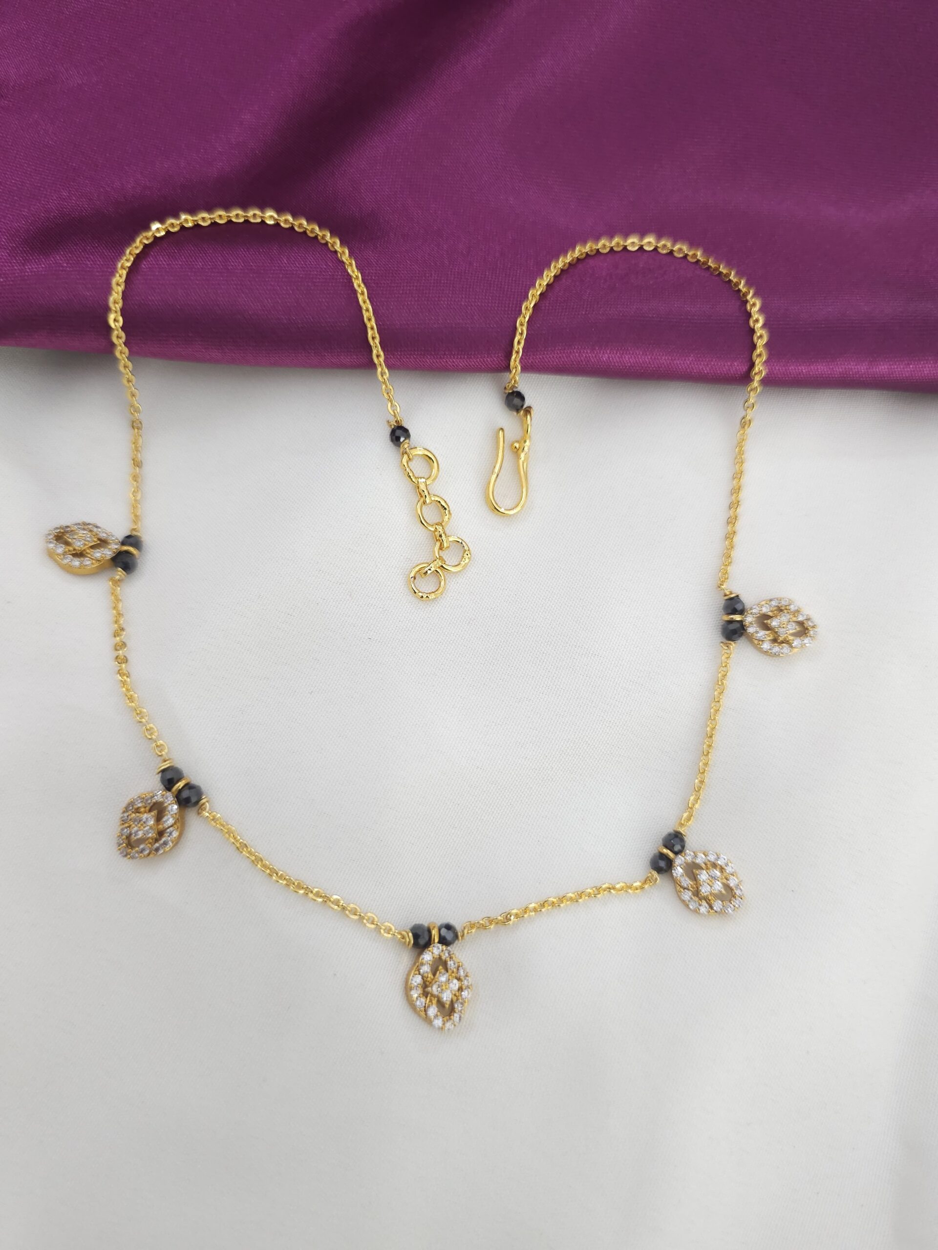 2026/01/1004957510-scaled.jpg Handmade Dimond cuts drops customized with black beads - Image 1