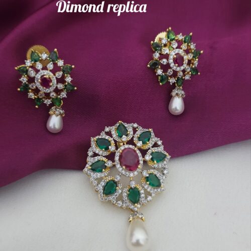 Dimond replica pendant set green stones