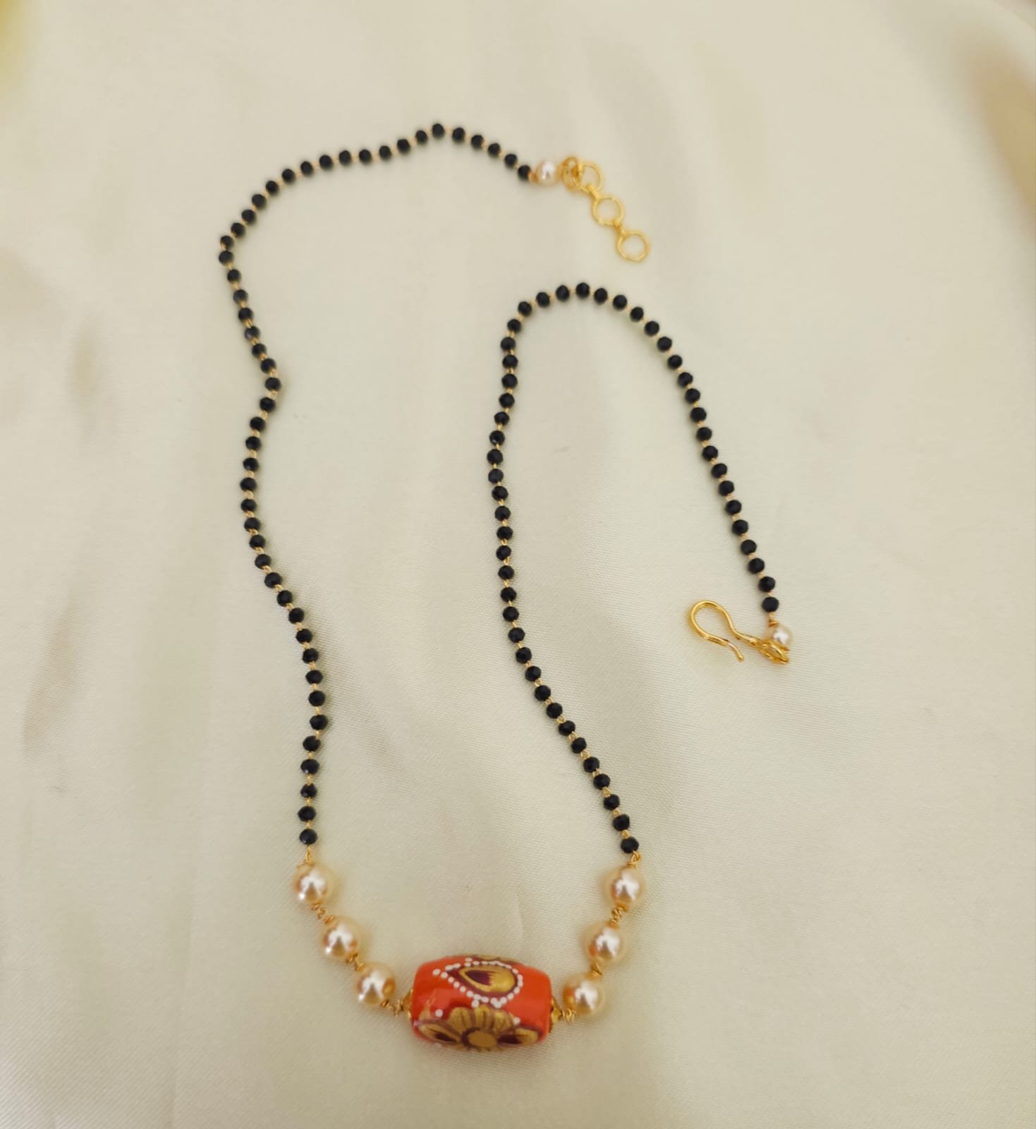 2026/04/IMG-20260411-WA0776.jpg Coral Swarovski spinner customized black beads 399 free shipping - Image 1