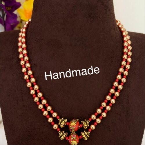 Golden Swarovski and Pagadam mala with carvin Nakshi ball 1350 free shipping
